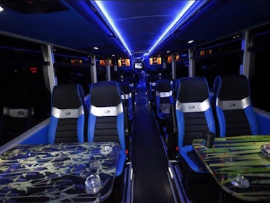 Party Bus Transfer w/ Topless Waitress (Vaclav Havel Airport to Hotel) in Prague