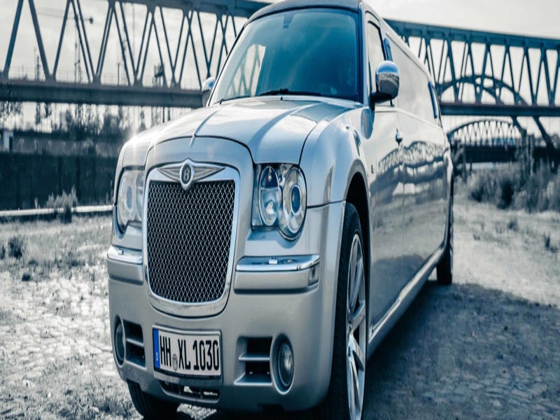 One Way Airport Transfer (Hamburg Airport to Accommodation) in Limo Chrysler 300 with Stripper