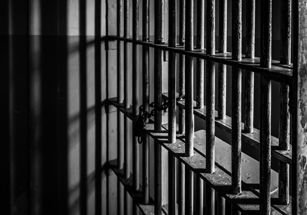 Black and white photo of prison cell