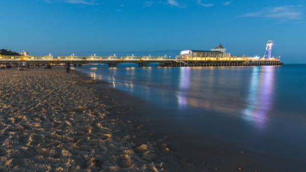 Image of Bournemouth beach and the pier in the evening