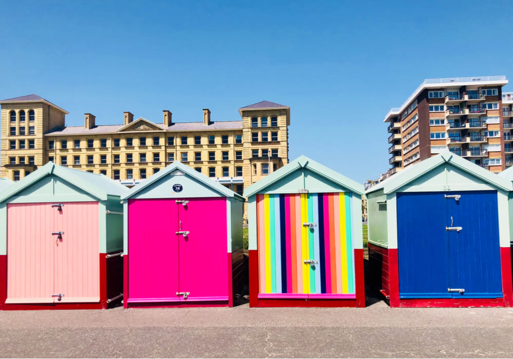 Brightly coloured beach huts for Brighton and Hove Pride