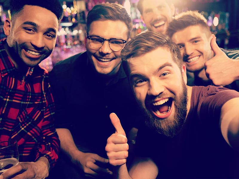 Man playing virtual party games with friends online