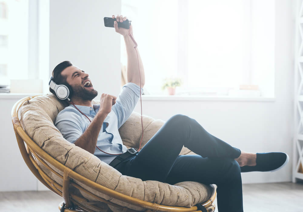 Man listening to music on virtual stag do